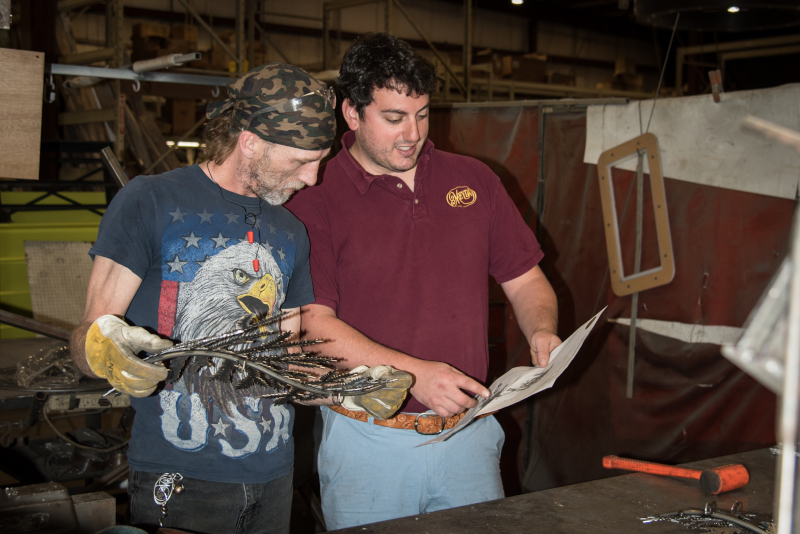 Two Meyda employees working